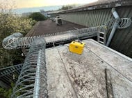 Concertina Razor Wire Fixed to Rooftop Allens Westhoughton